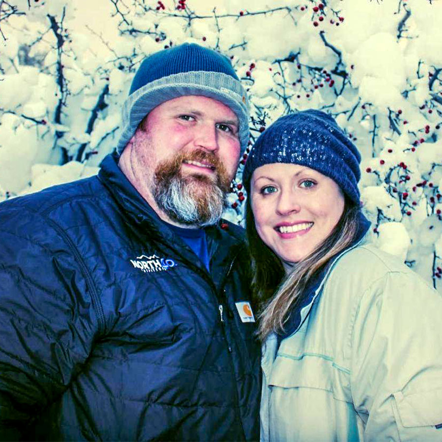 North 40 Outfitters Spokane, Washington Store Manager Micah Griffin and his wife smiling at the camera